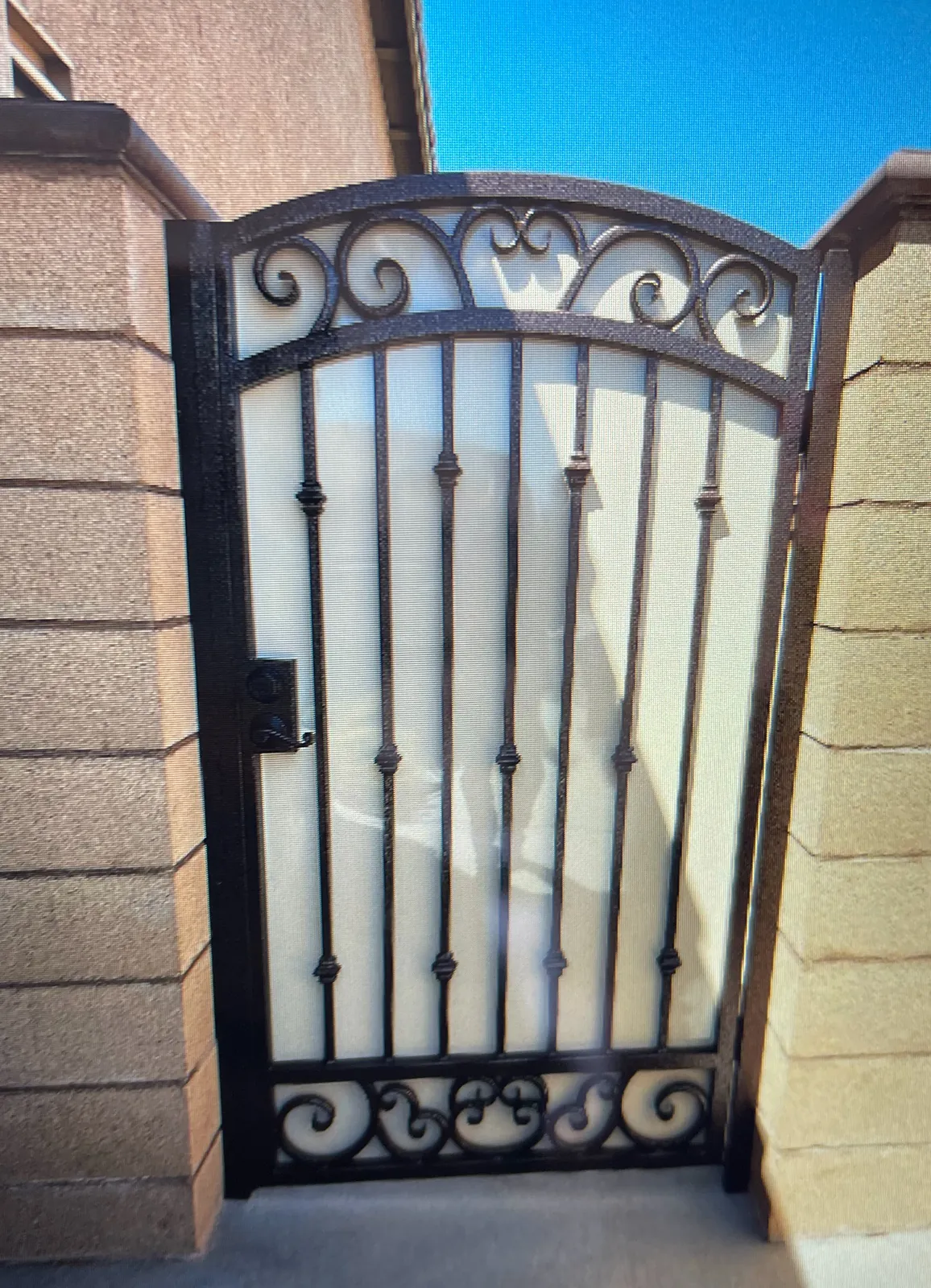 Bronze arched scroll side gate with privacy panel