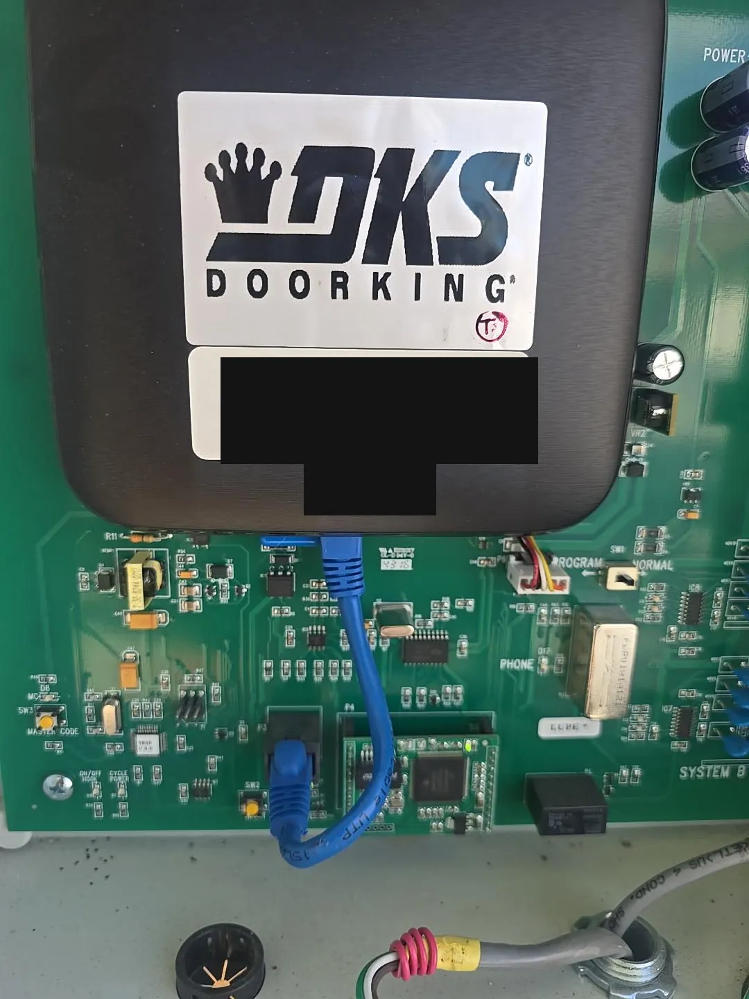 DoorKing gate access control board during service