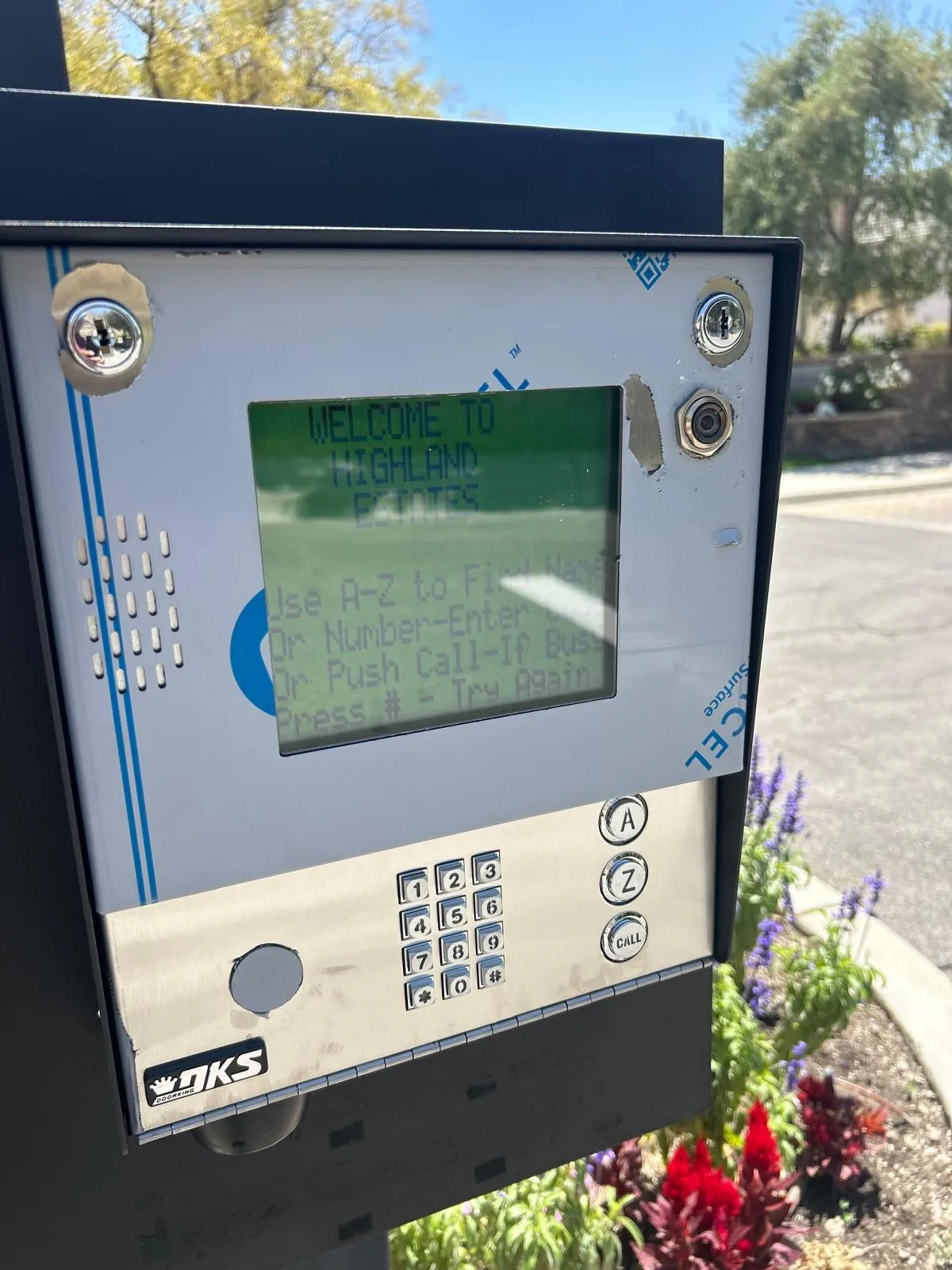 DoorKing telephone entry call box with directory and keypad